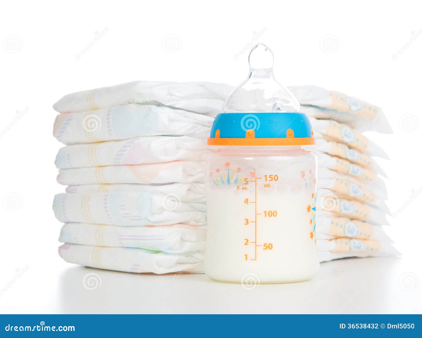 Child Stack Of Diapers And Baby Feeding Bottle With Milk Stock ...