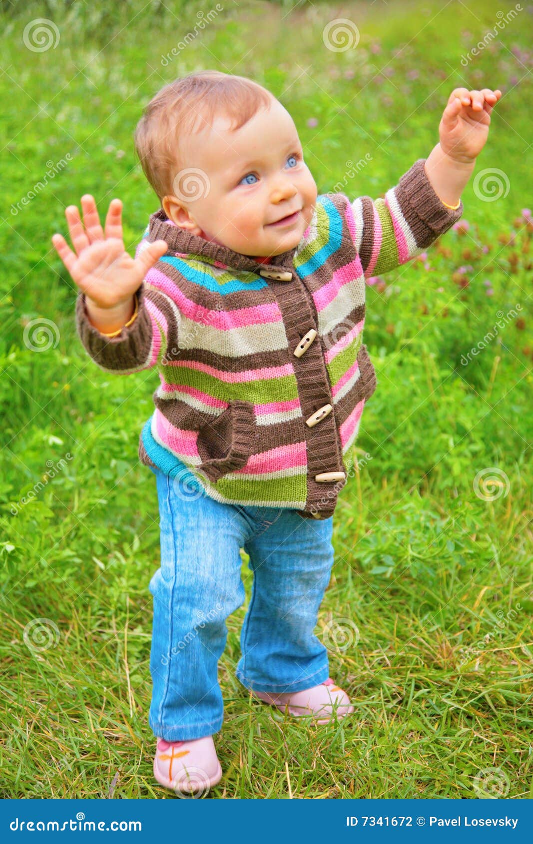 Child stands on grass stock photo. Image of head, health - 7341672