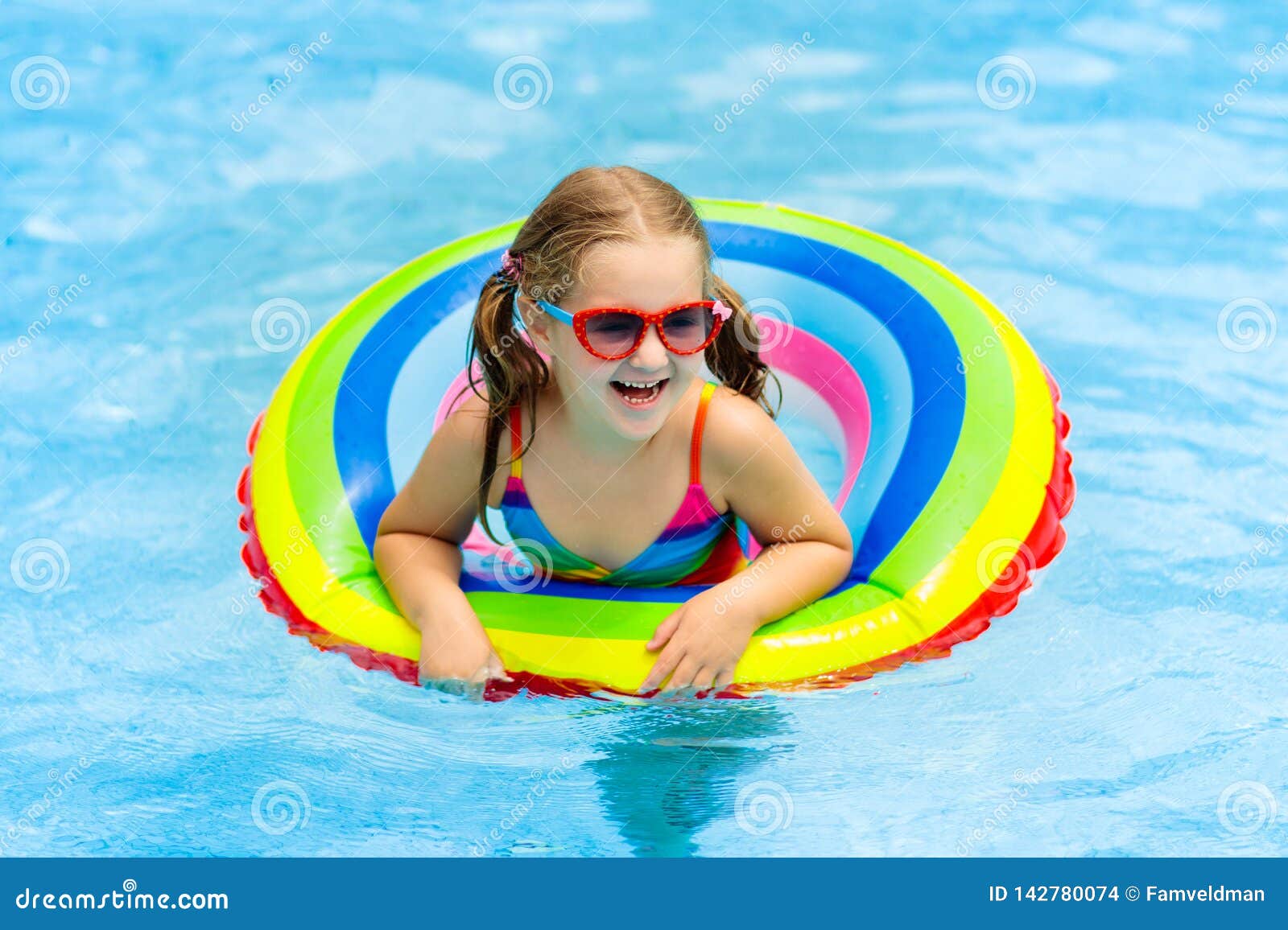 Child in Swimming Pool on Toy Ring. Kids Swim Stock Photo - Image of  little, rainbow: 142780074