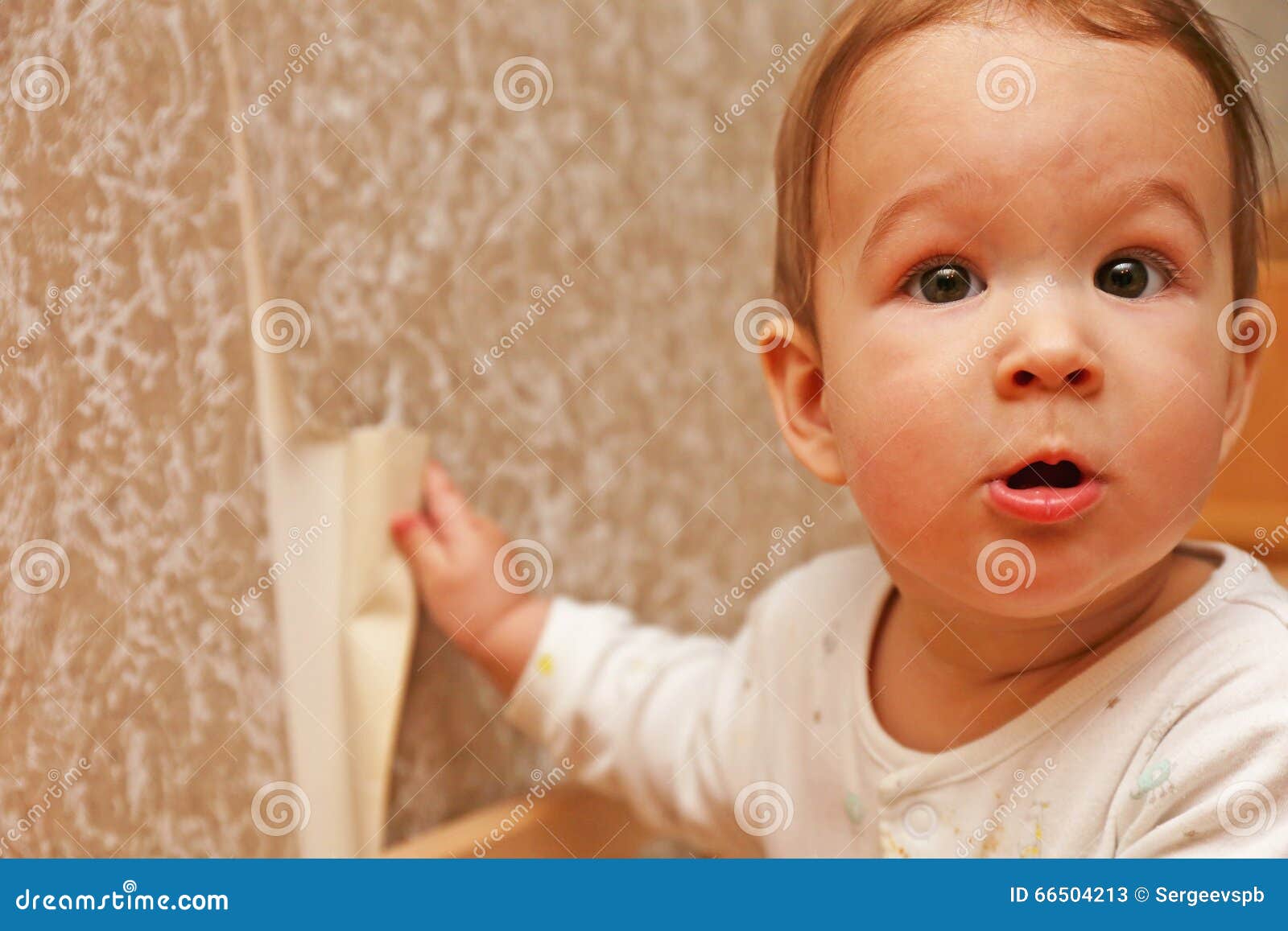 Child Tears Off a Piece of Wallpaper Stock Image - Image of play, home:  66504213