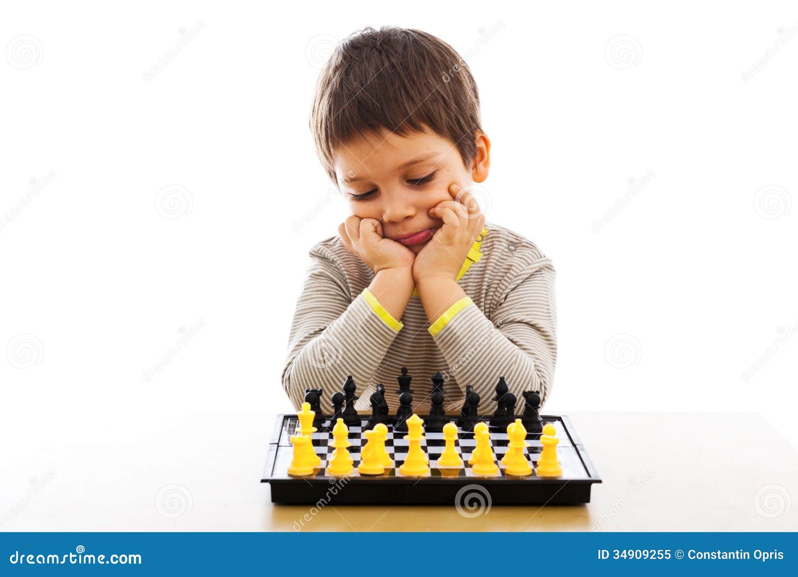 Woman playing chess thinking of next move Stock Photo - Alamy