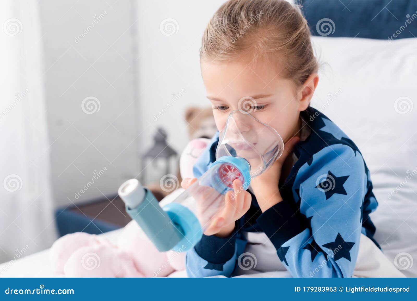 Child Using Inhaler with Spacer in Stock Image Image of inhaler