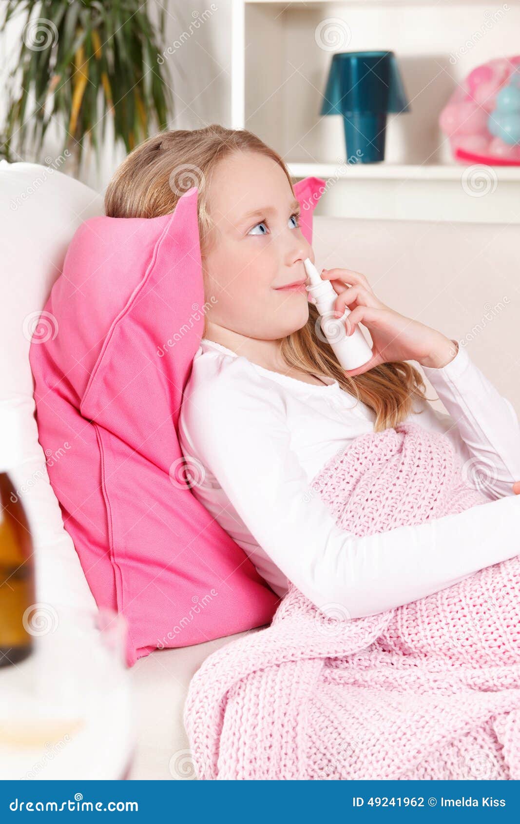 Child using nasal spray stock photo. Image of blonde 49241962