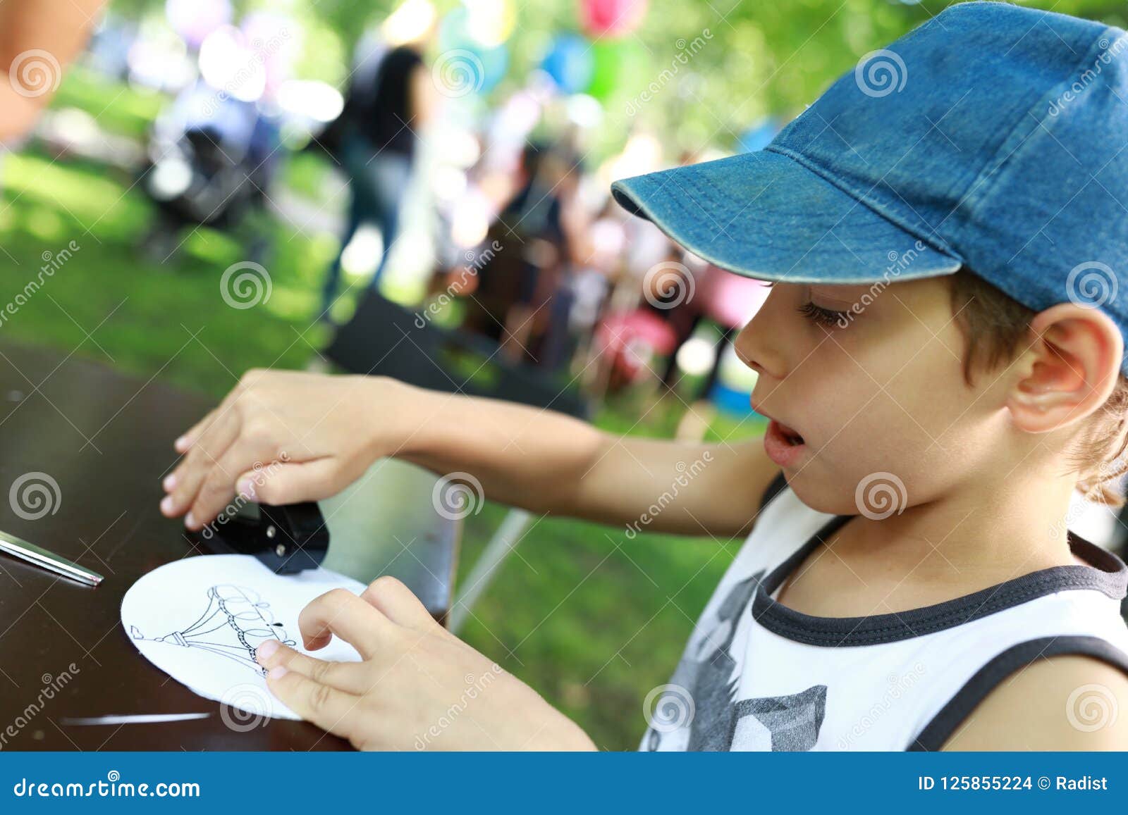 Child using stapler stock photo. Image of table, playful 125855224