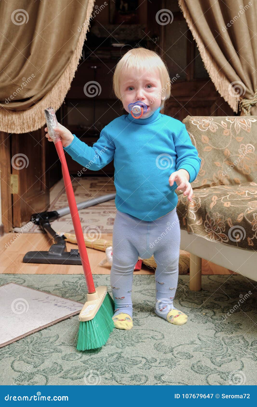Child vacuuming a room stock image. Image of sitting - 107679647