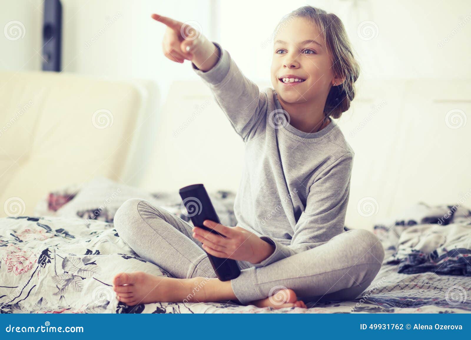Child watching  tv  stock photo Image of living pajamas 49931762