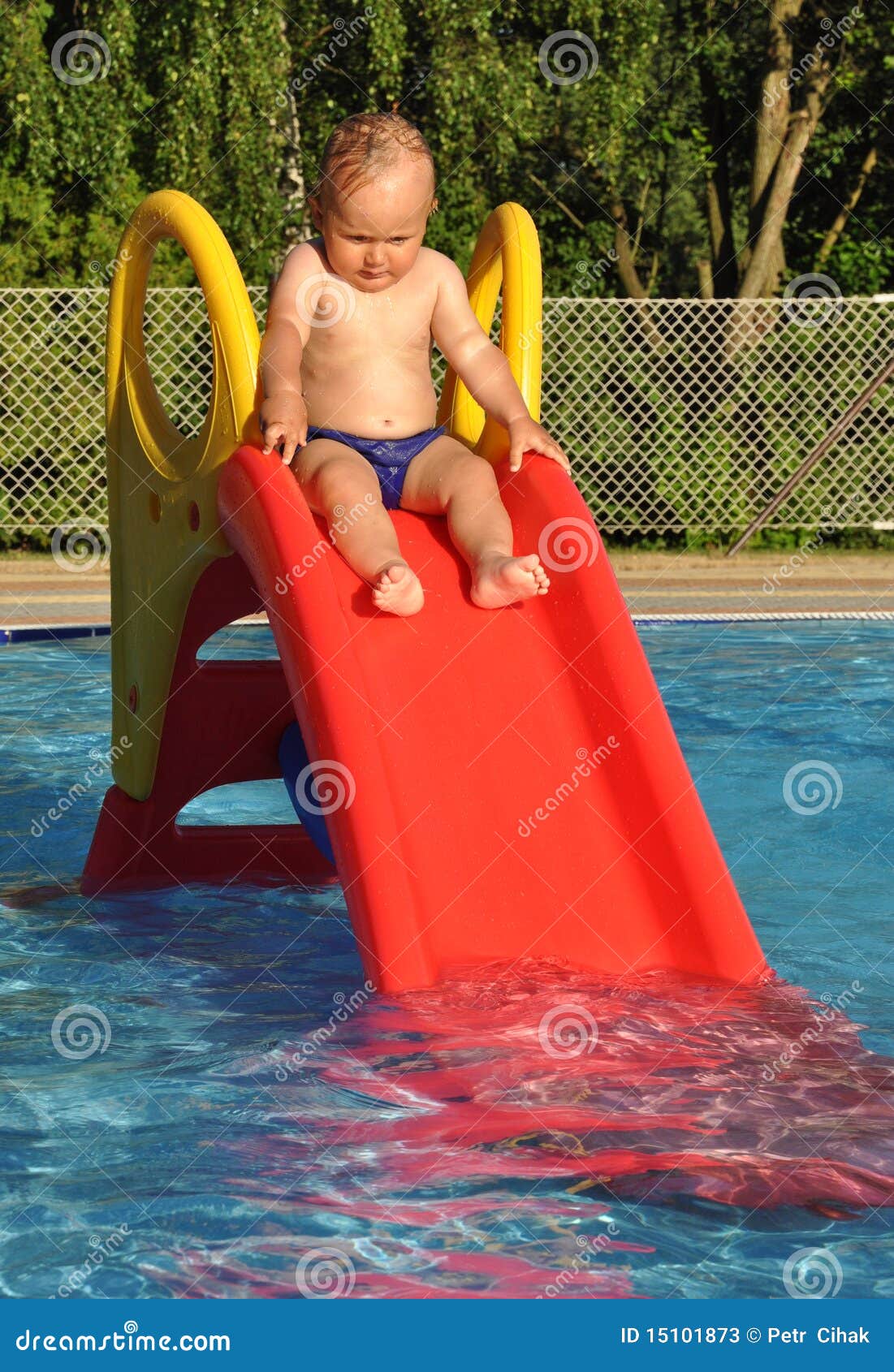 child on water slide