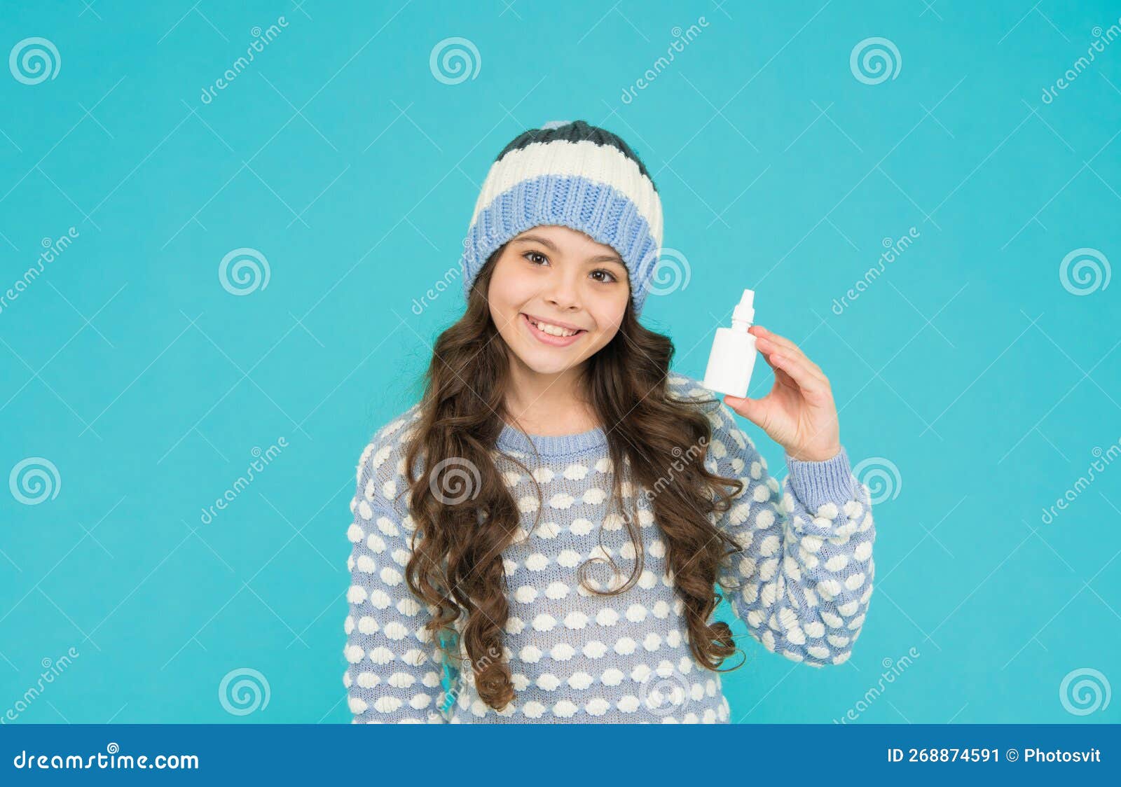 childhood healthcare. teen girl with nasal spray. no addiction to medicals. kid in warm sweater