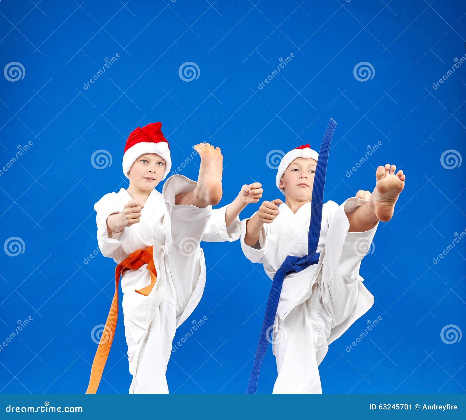 Children on a Blue Background Beat Kick Leg Stock Image Image of