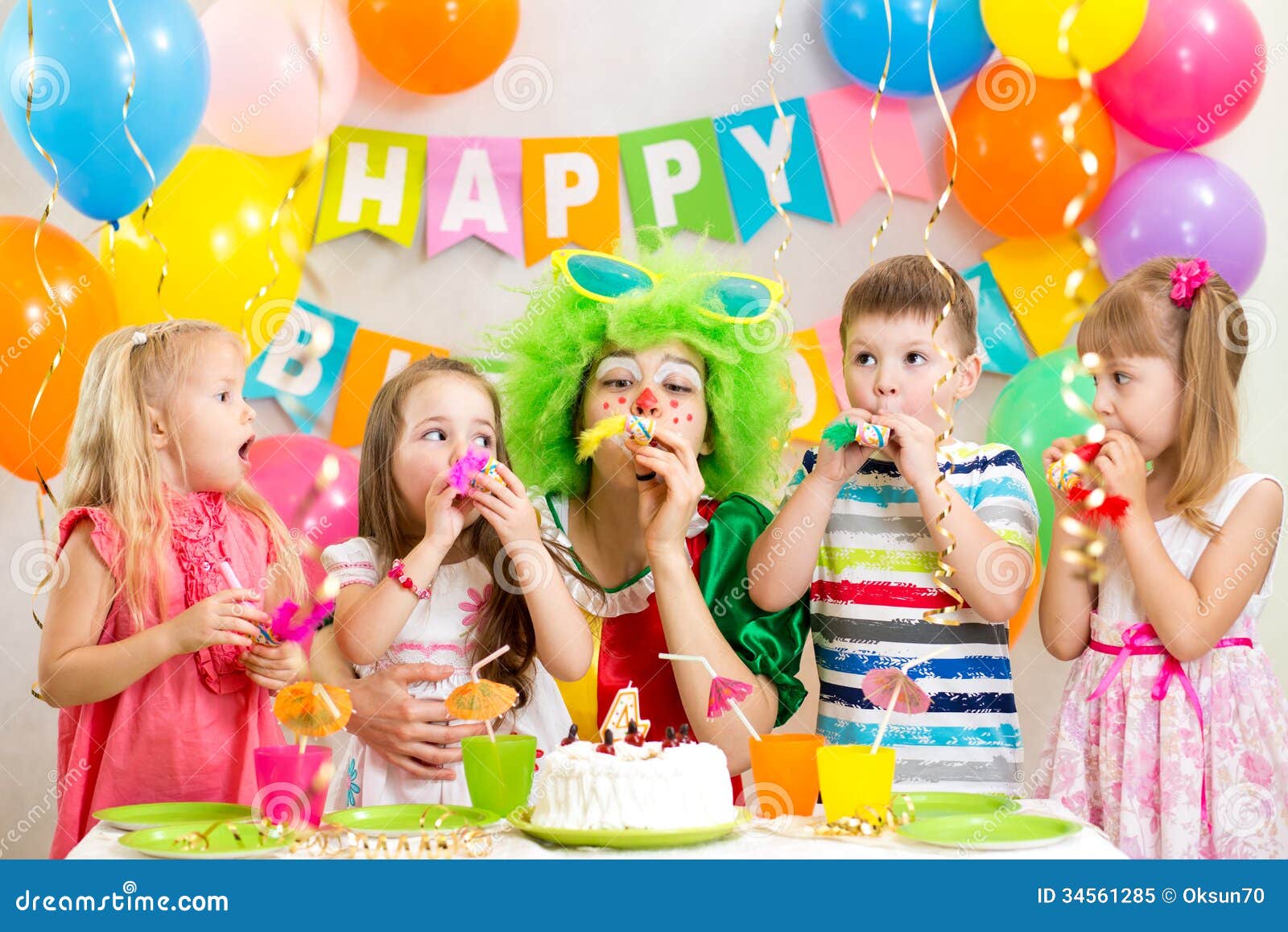 Children and clown at birthday party. Kids and clown at birthday party