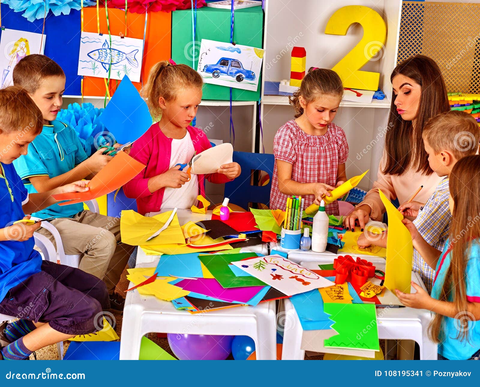 Children are Making Something Out of Colored Paper. Stock Image - Image ...