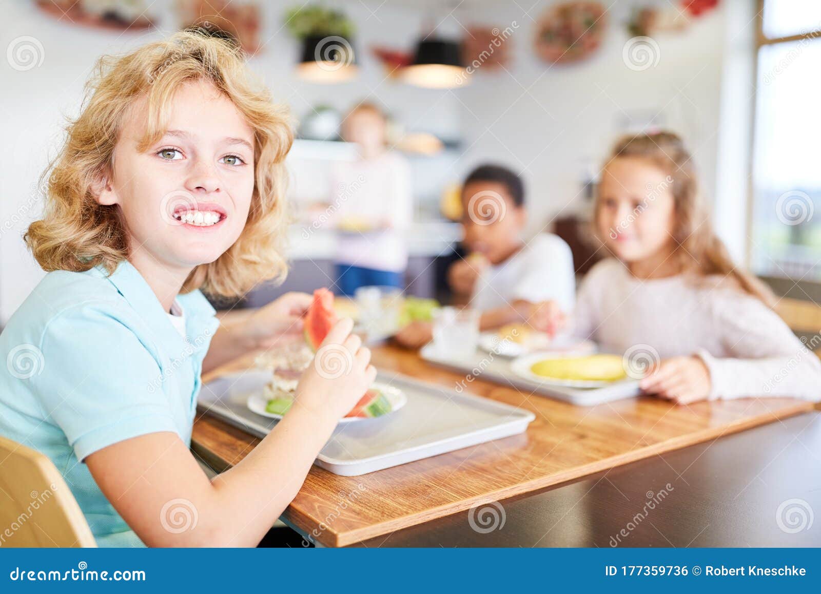 Children eat in school canteen Royalty Free Vector Image