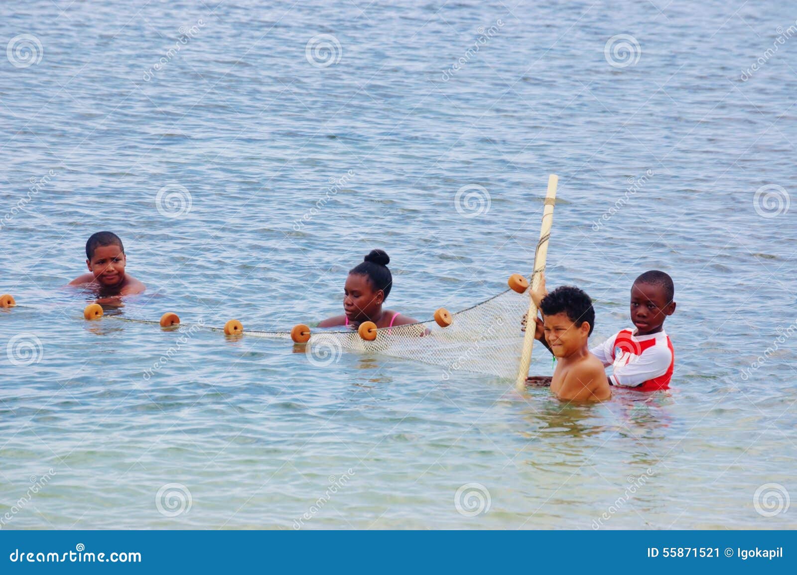 Children with fishing net editorial photo. Image of girls - 55871521