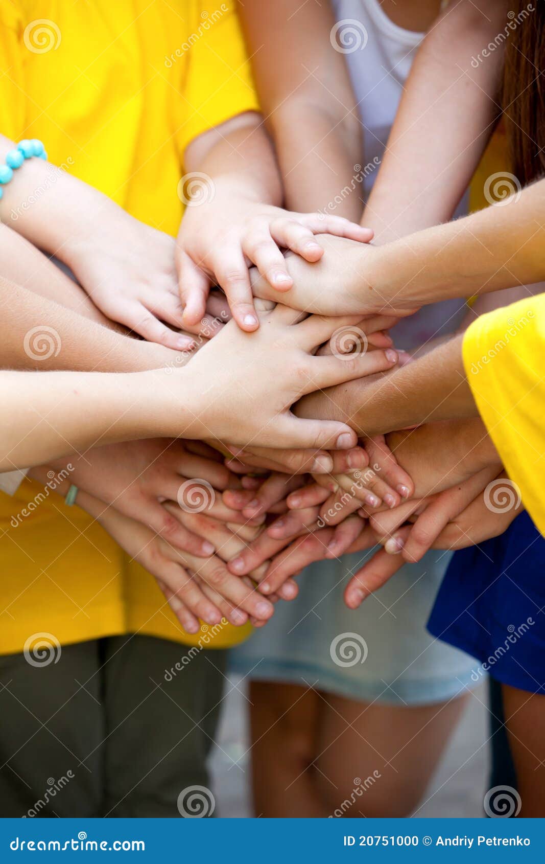 children have combined hands together