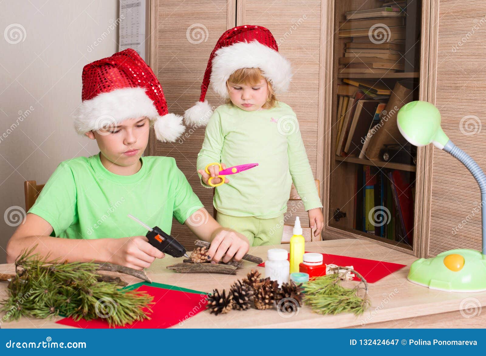 Children Making Christmas Decorations. Make Christmas Decoration Stock