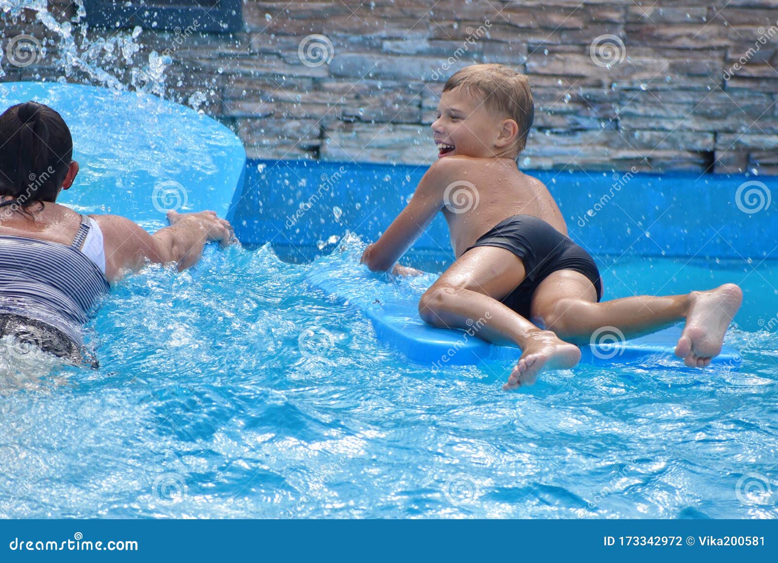 Children in the Outdoor Pool. Funny Kids at the Water Park. Happy ...