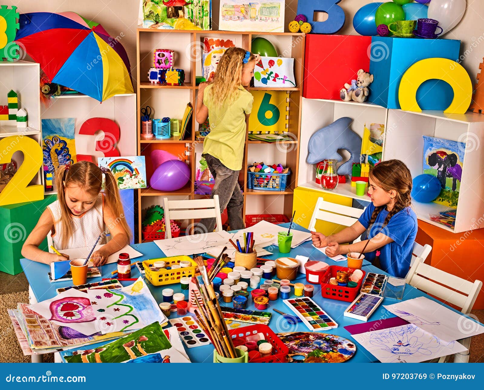 Children Painting and Drawing Together. Craft Lesson in Primary School