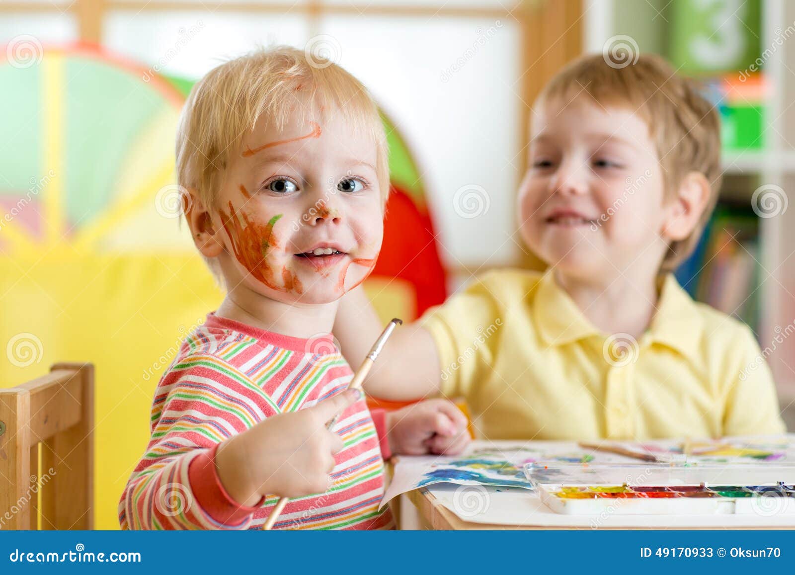 children painting at home or playschool