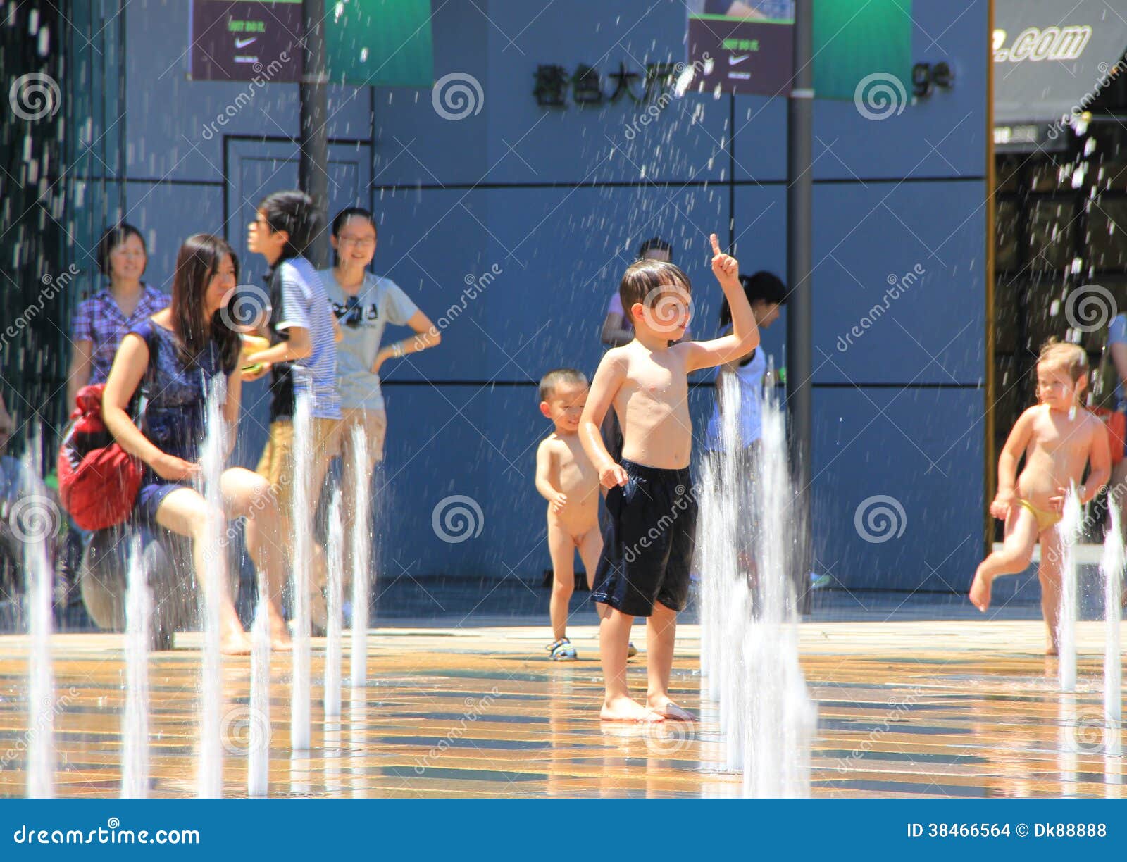 Children play a fountain editorial stock image. Image of activity 38466564