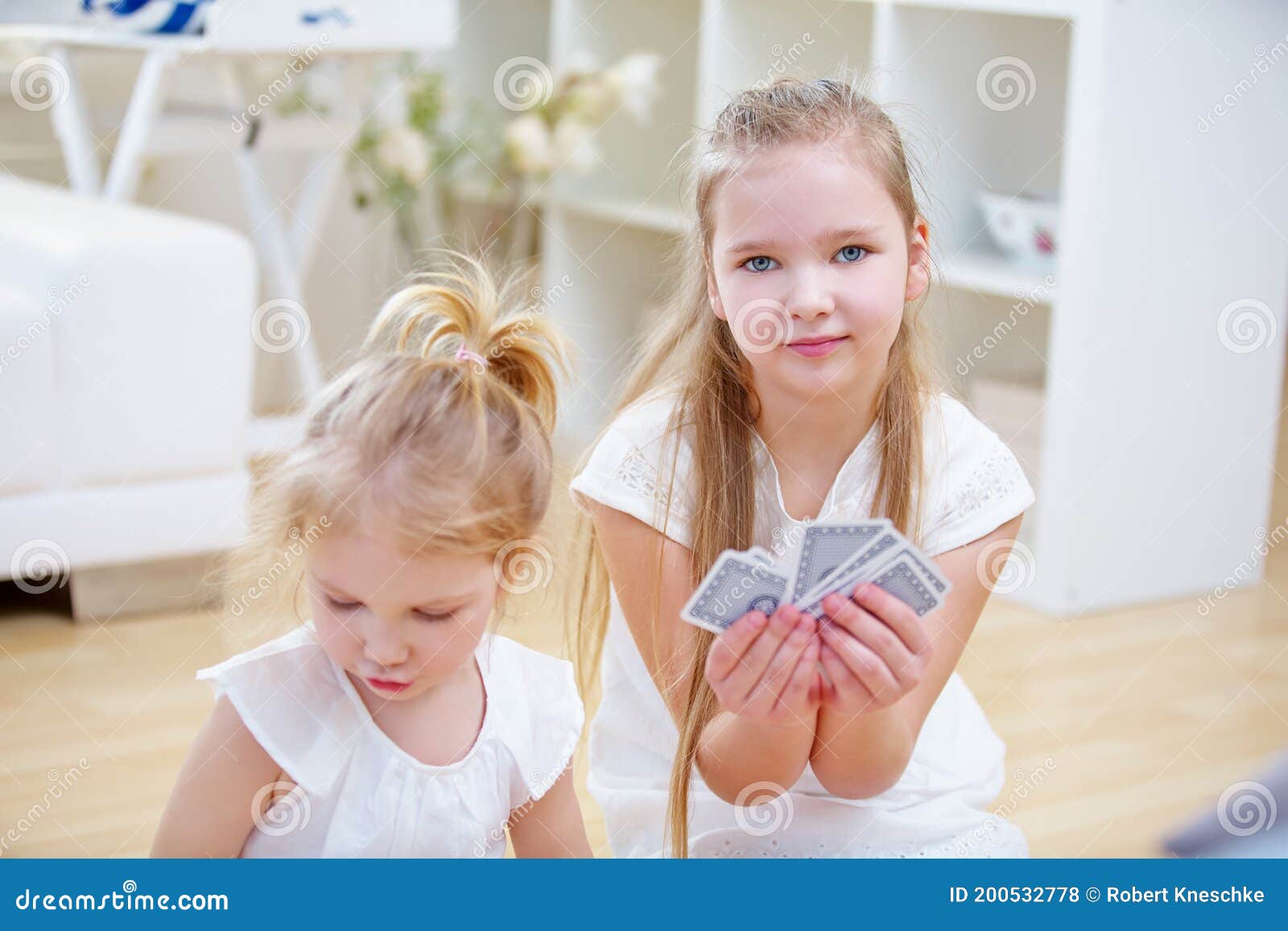Children Play with Cards at Home Stock Photo Image of people