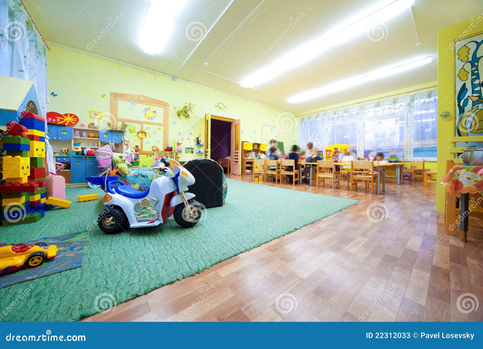 children play to room where many toys.