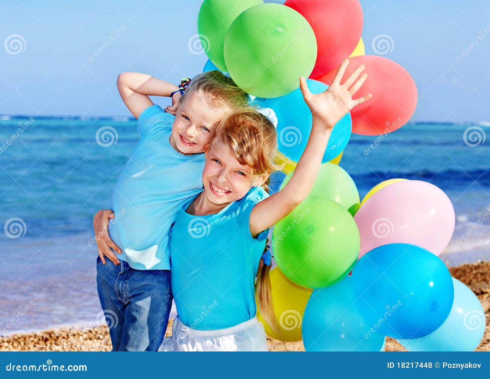 Children Playing with Balloons at the Beach Stock Photo Image of