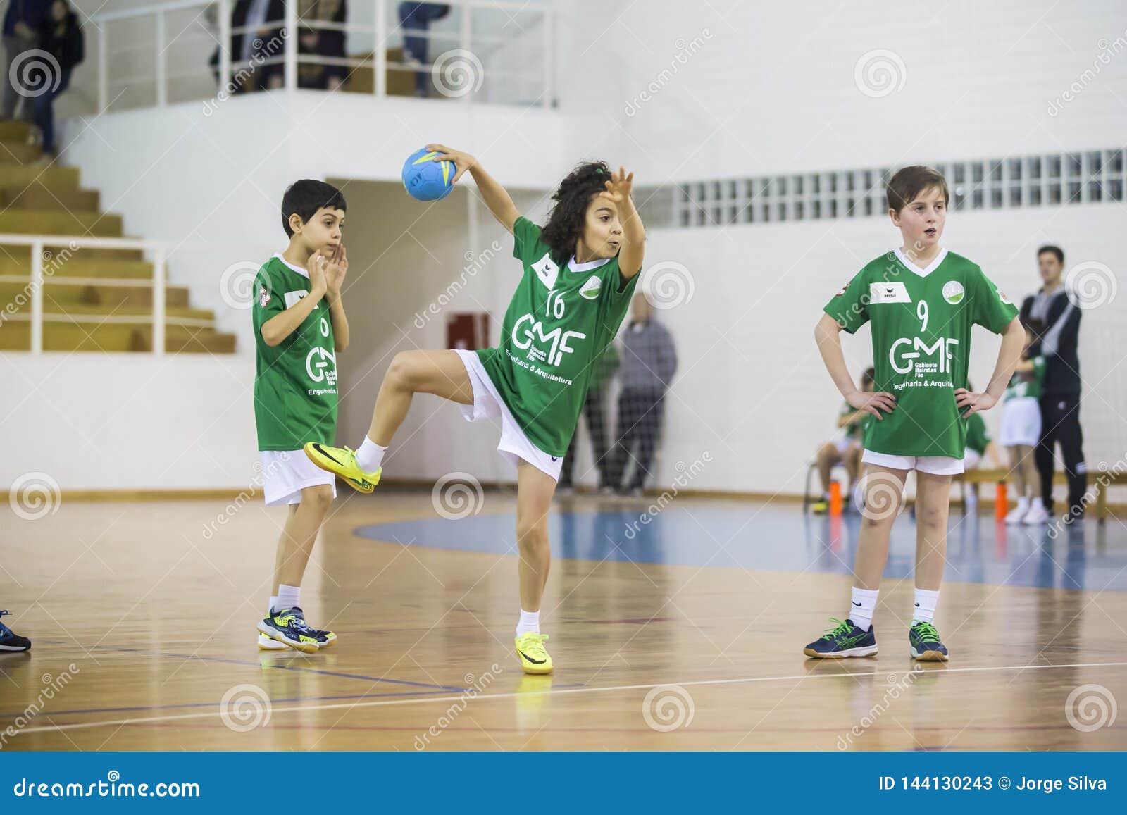 Children playing handball. editorial stock photo. Image of afifense