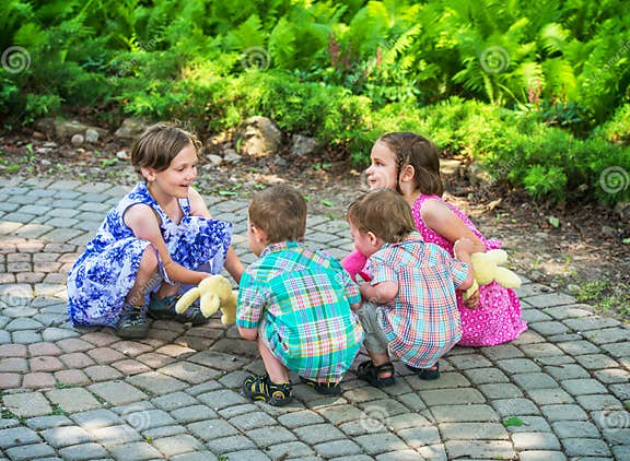 Children Playing Ring Around The Rosie Stock Photo Image Of Happy