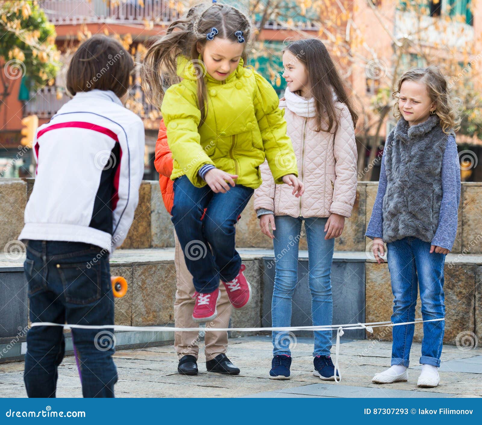 Children Playing Rubber Band Jumping Stock Image Image of person