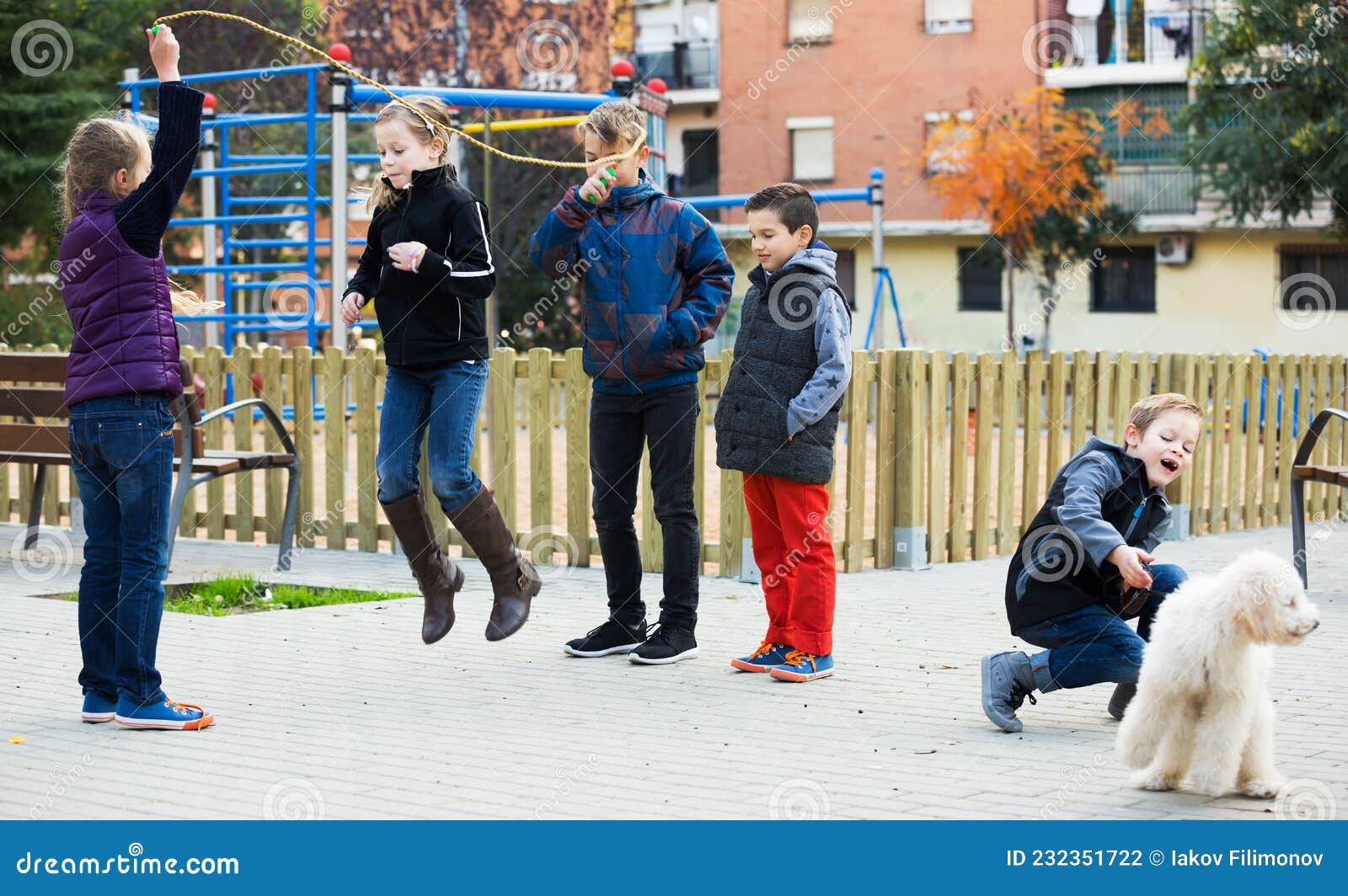 Children Playing Skipping Rope Stock Photo - Image of activity, city