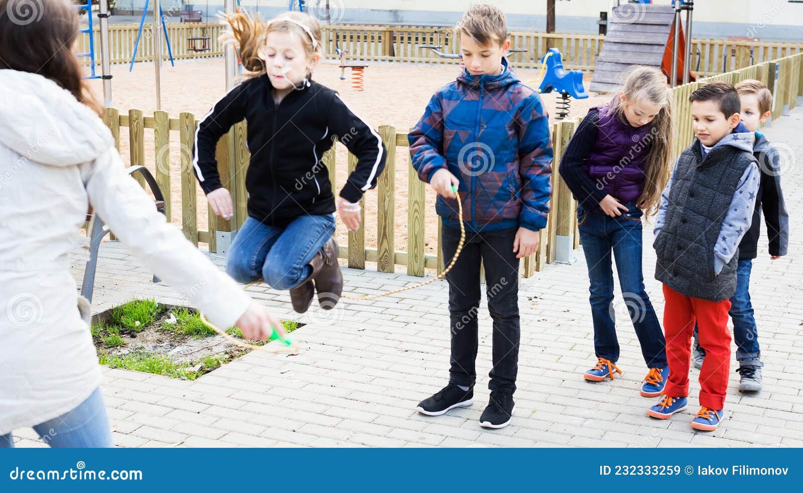 Children Playing Skipping Rope Stock Image - Image of little