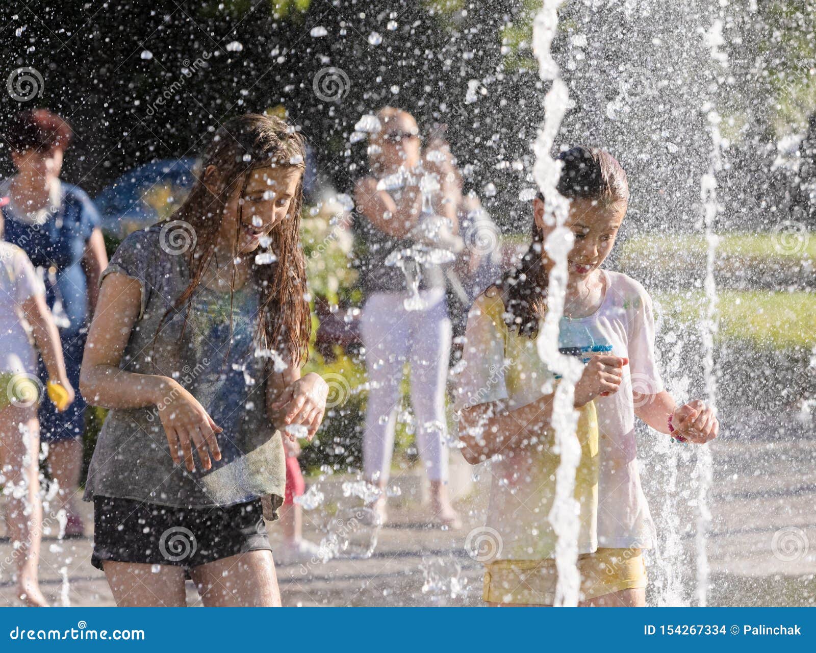 Children Playing in a Water Fountain Editorial Stock Image - Image of ...