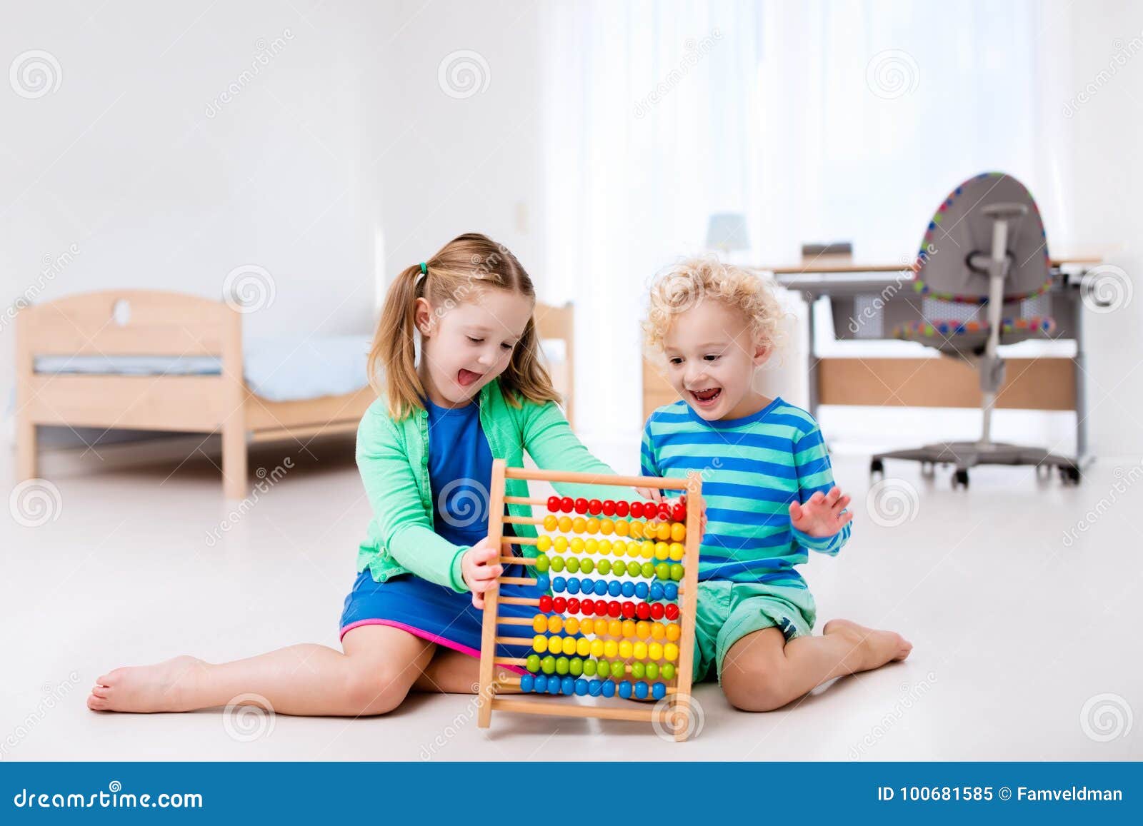 Kids Playing With Wooden Abacus Educational Toy Stock Image