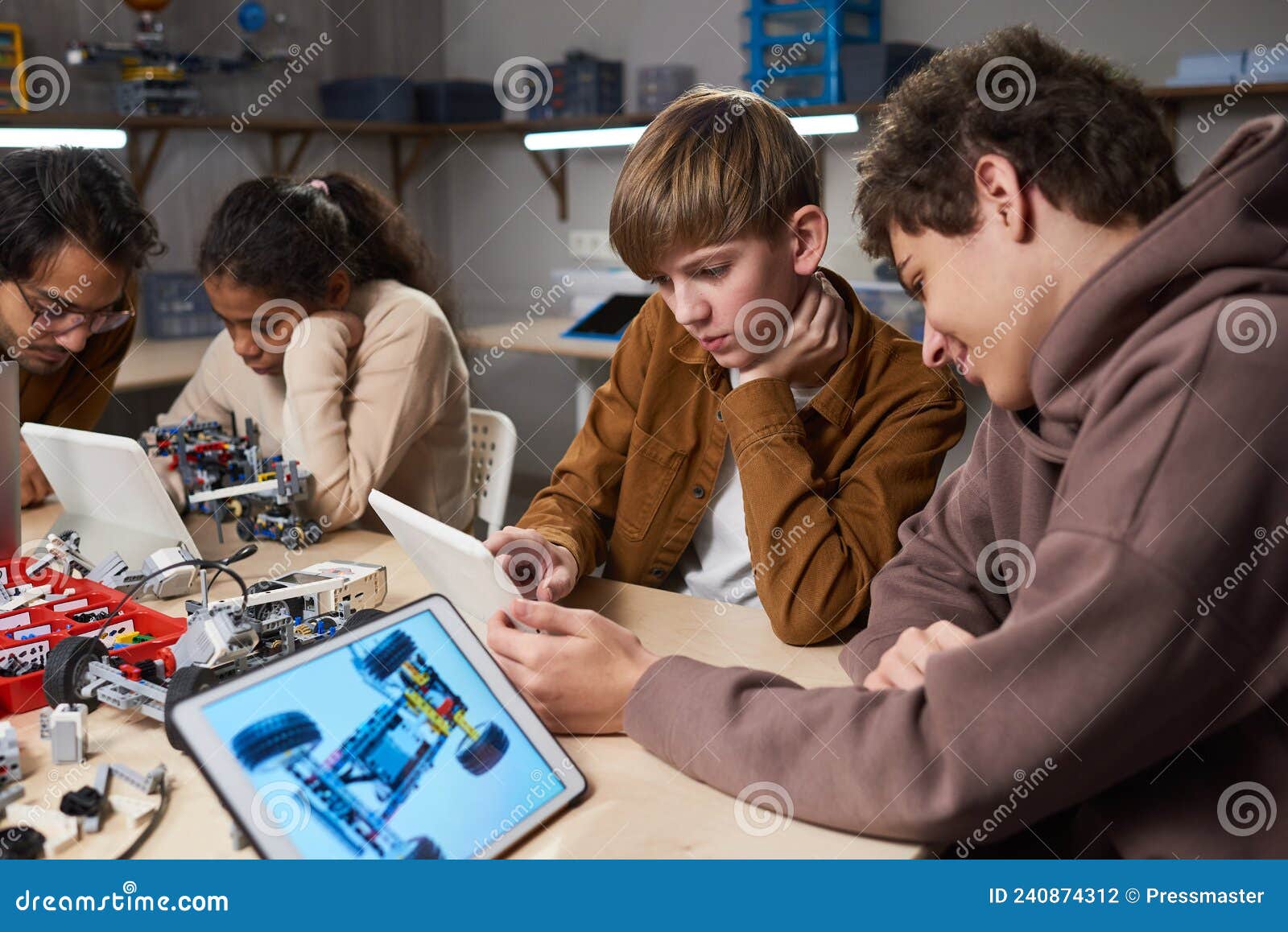 Children Programming Robots in Engineering Class Stock Photo - Image of ...