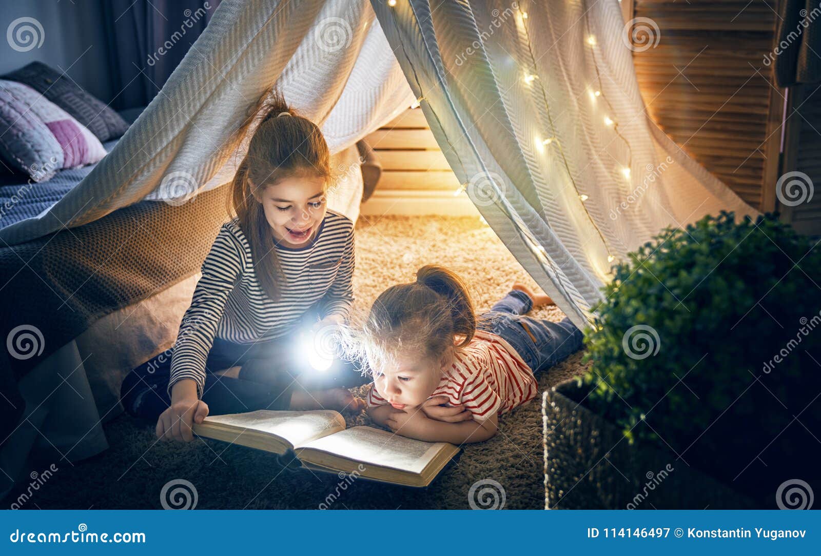 These girls are having fun in the reading room