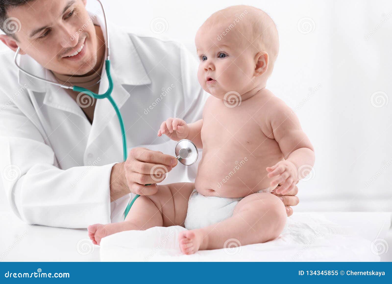 Children`s Doctor Examining Baby with Stethoscope Stock Image Image
