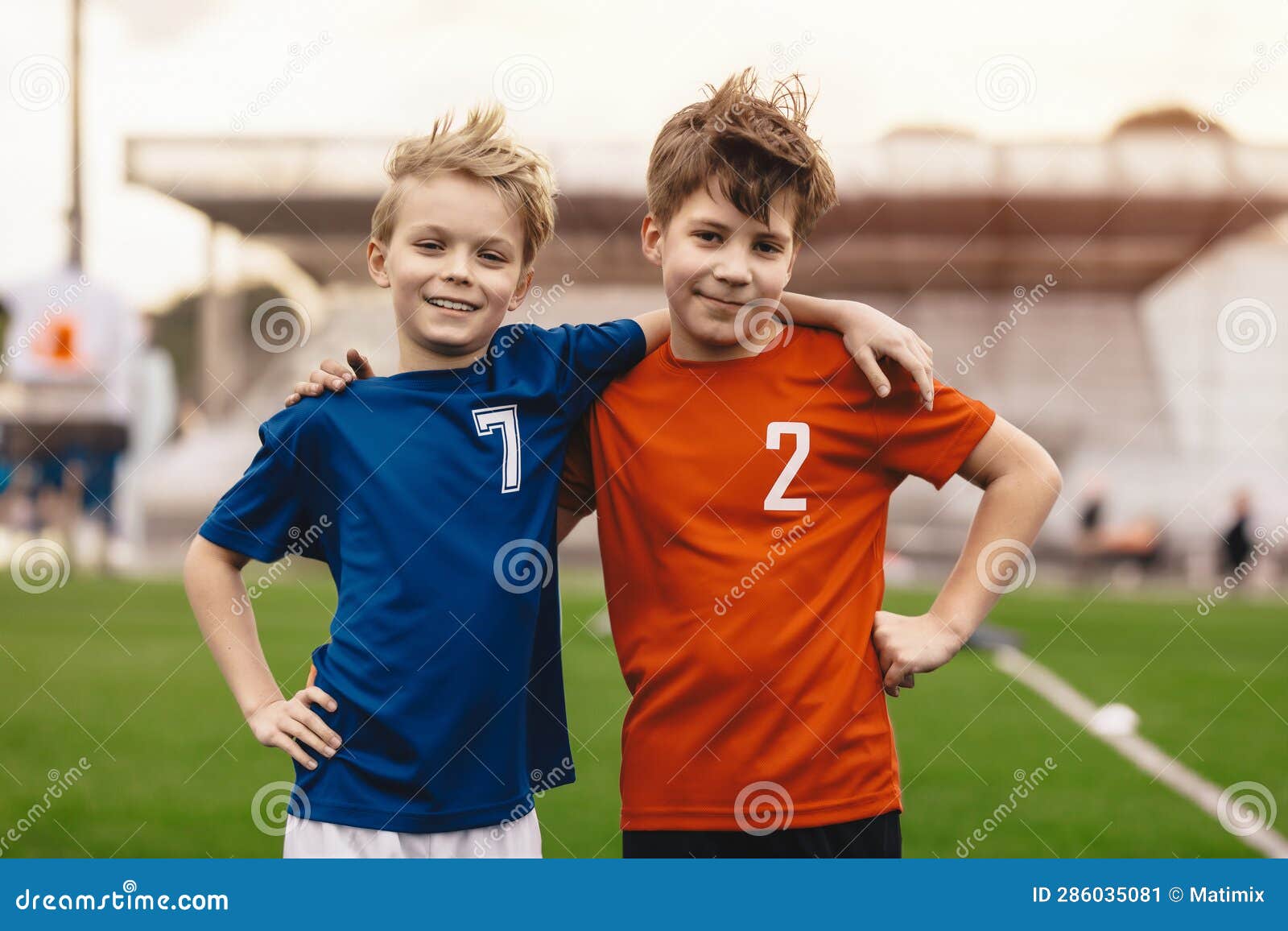 children's friendship in sports competition. kids soccer players in school sports tournaments