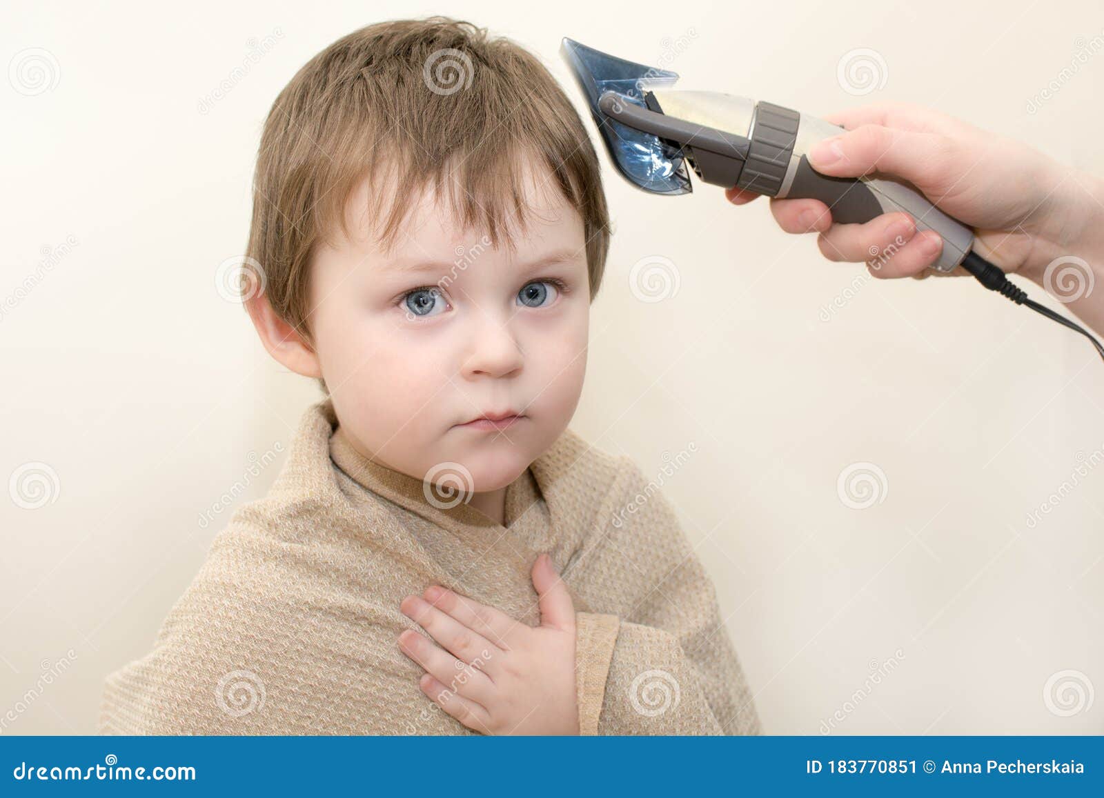 Children`s Haircut at Home. a Little Blue-eyed Child is Looking into the Frame Stock Image - Image of hand, clipper: 183770851 Children`s Haircut at Home. a Little Blue-eyed Child is Looking into the Frame Stock Image - Image of hand, clipper: 183770851
