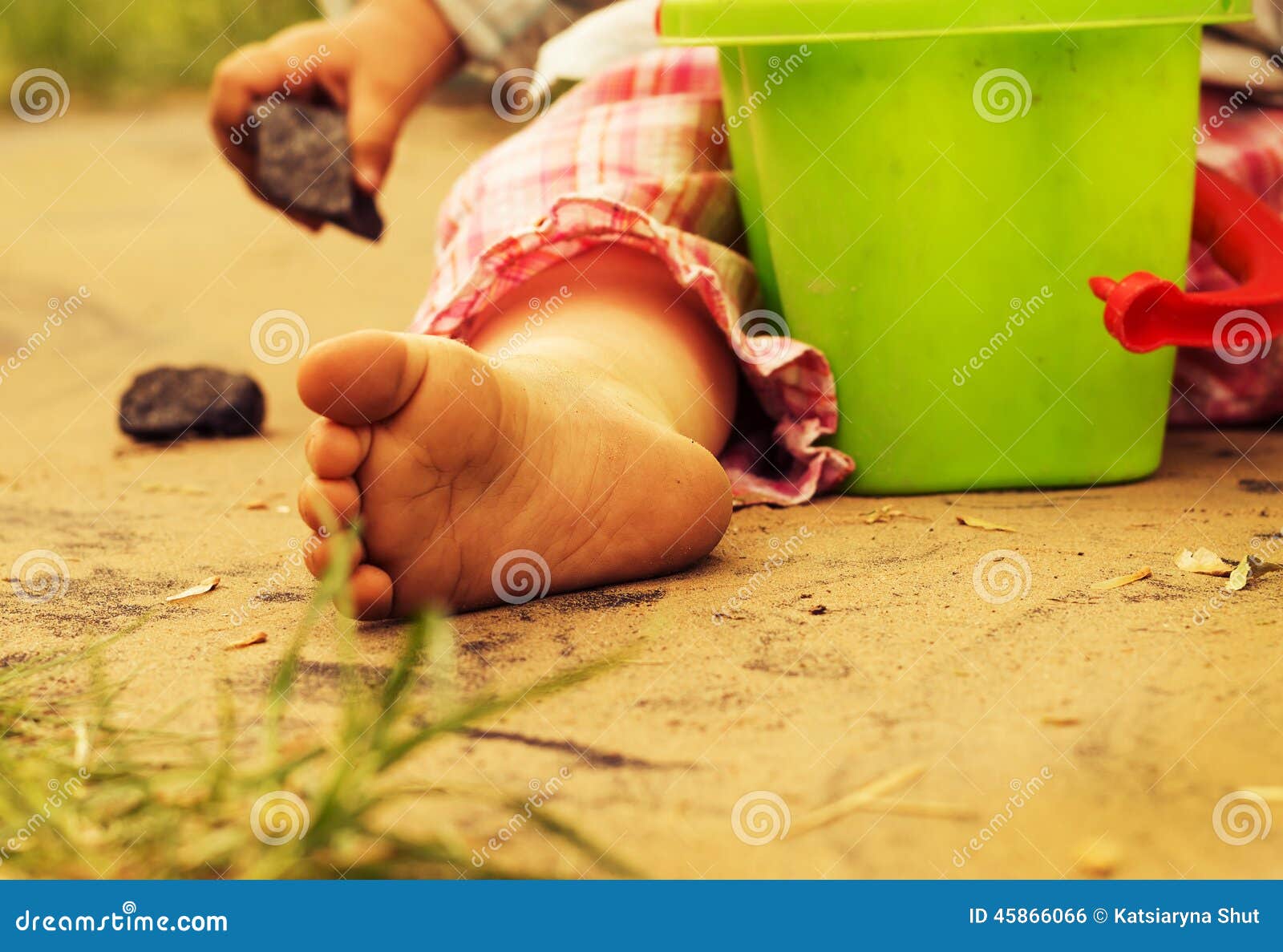 children's pinches on warm sand