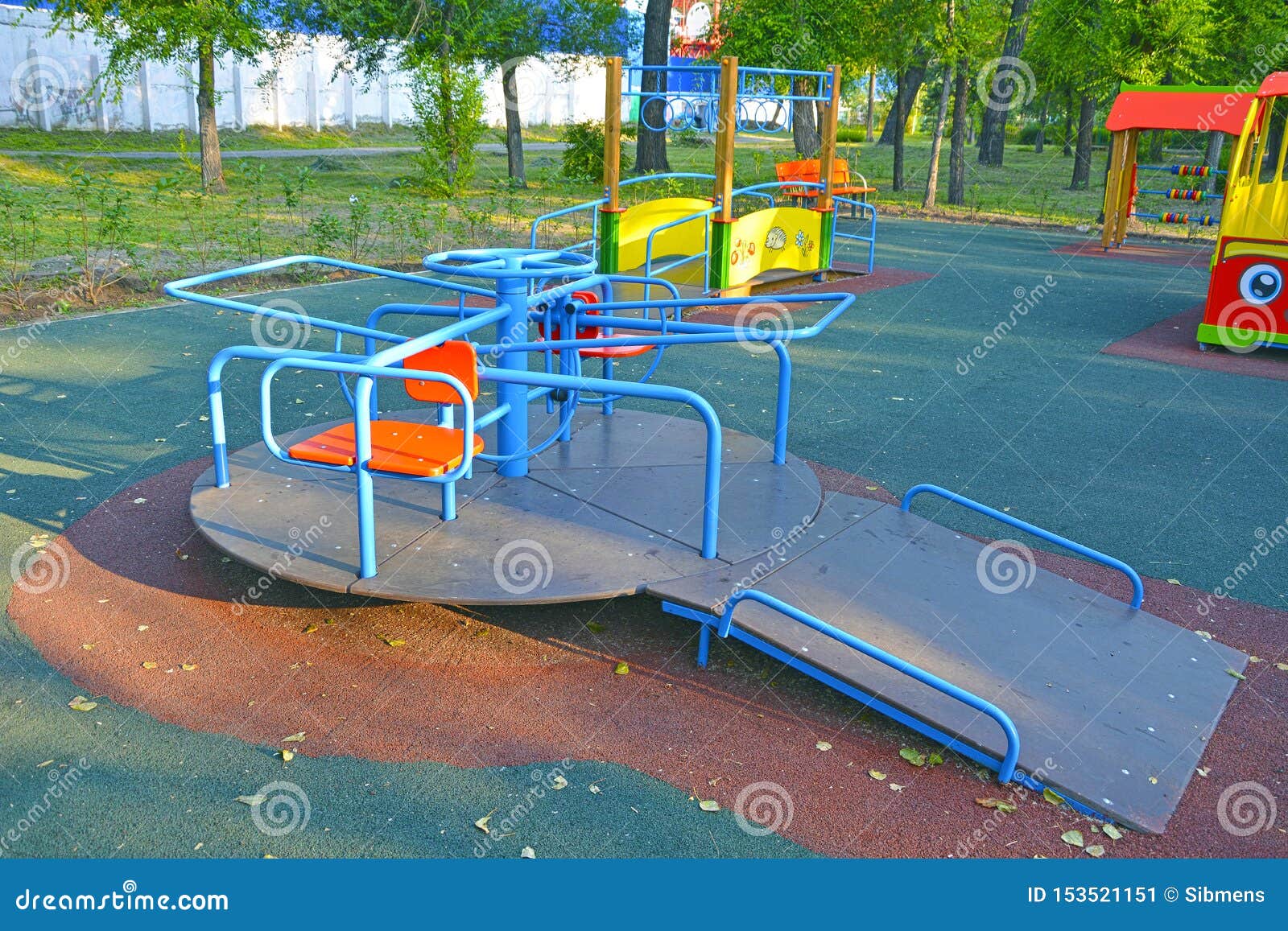 children`s revolving carousel in the park, for children with disabilities. russia