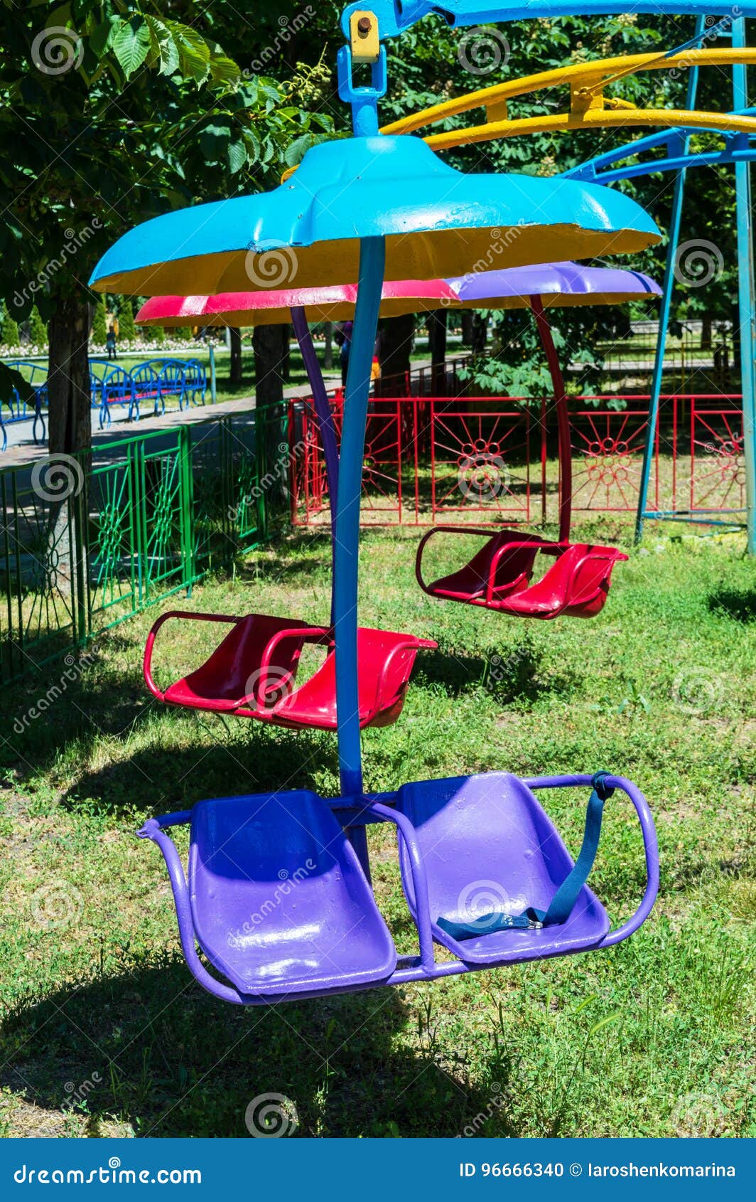 Children`s Swing in the Amusement Park. Stock Photo Image of motion