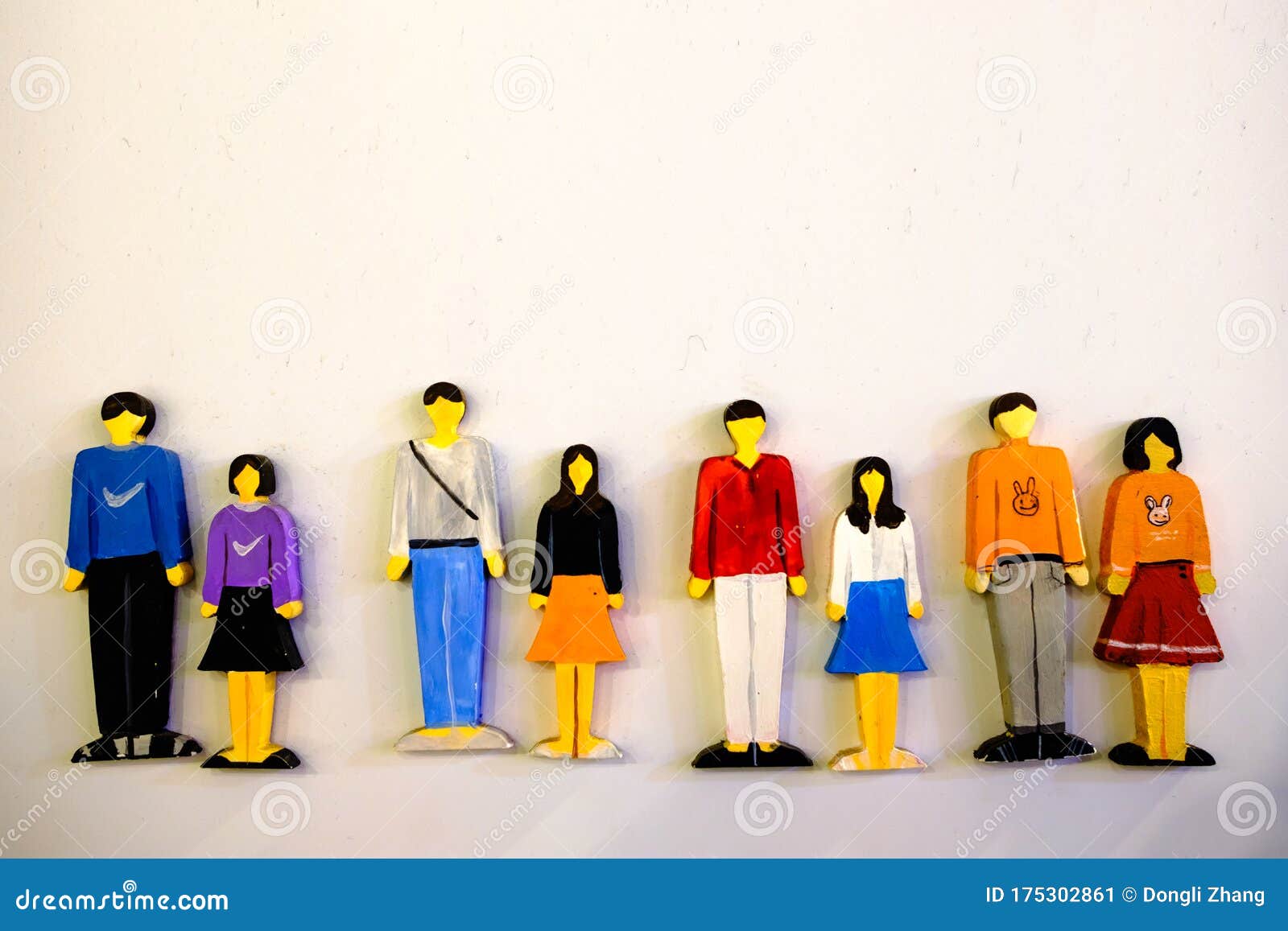 Children`s Toy Made of Natural Wood People of Different Color Stock ...