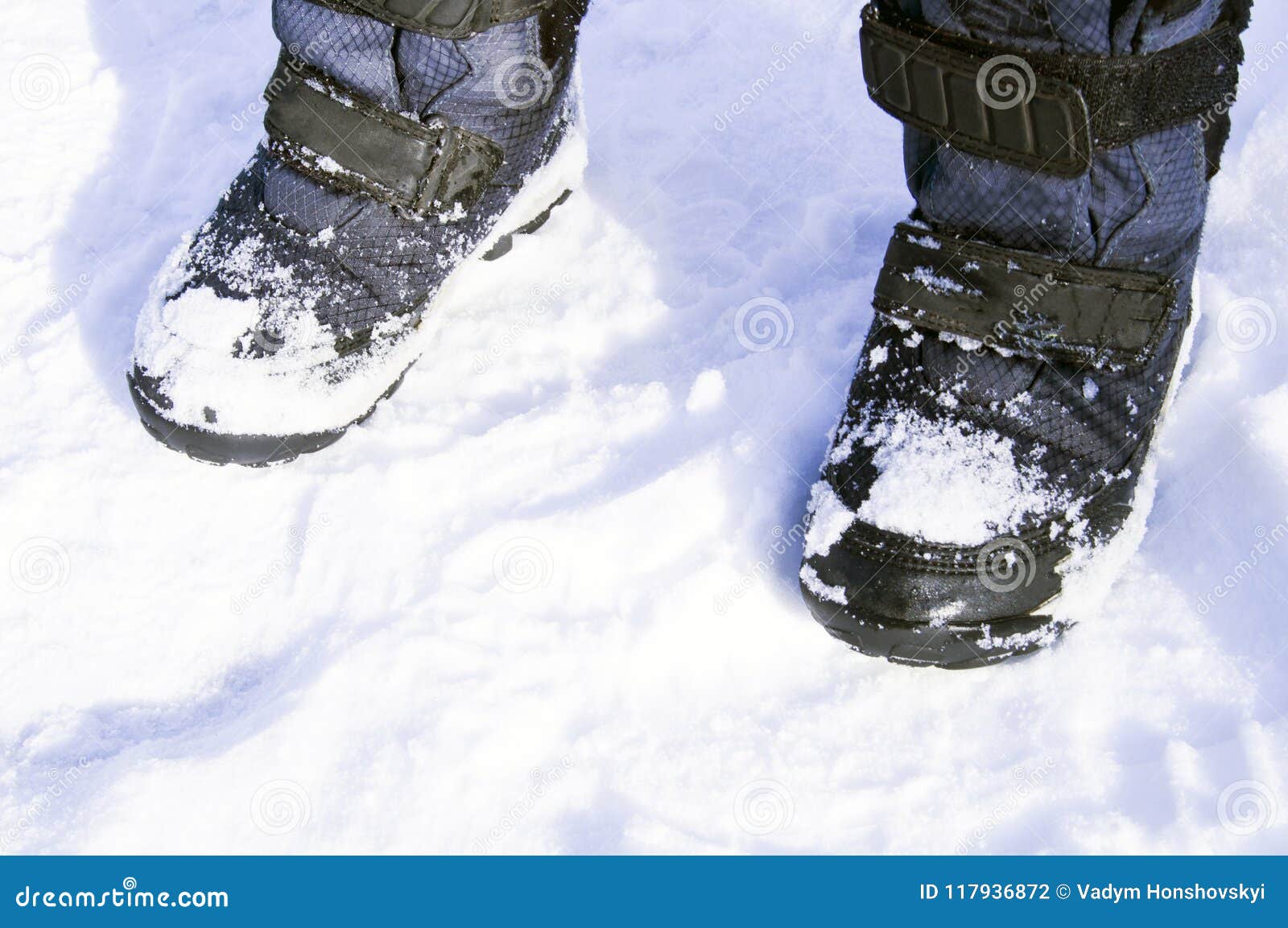 Children`s Winter Boots on White Snow Stock Photo - Image of boot ...