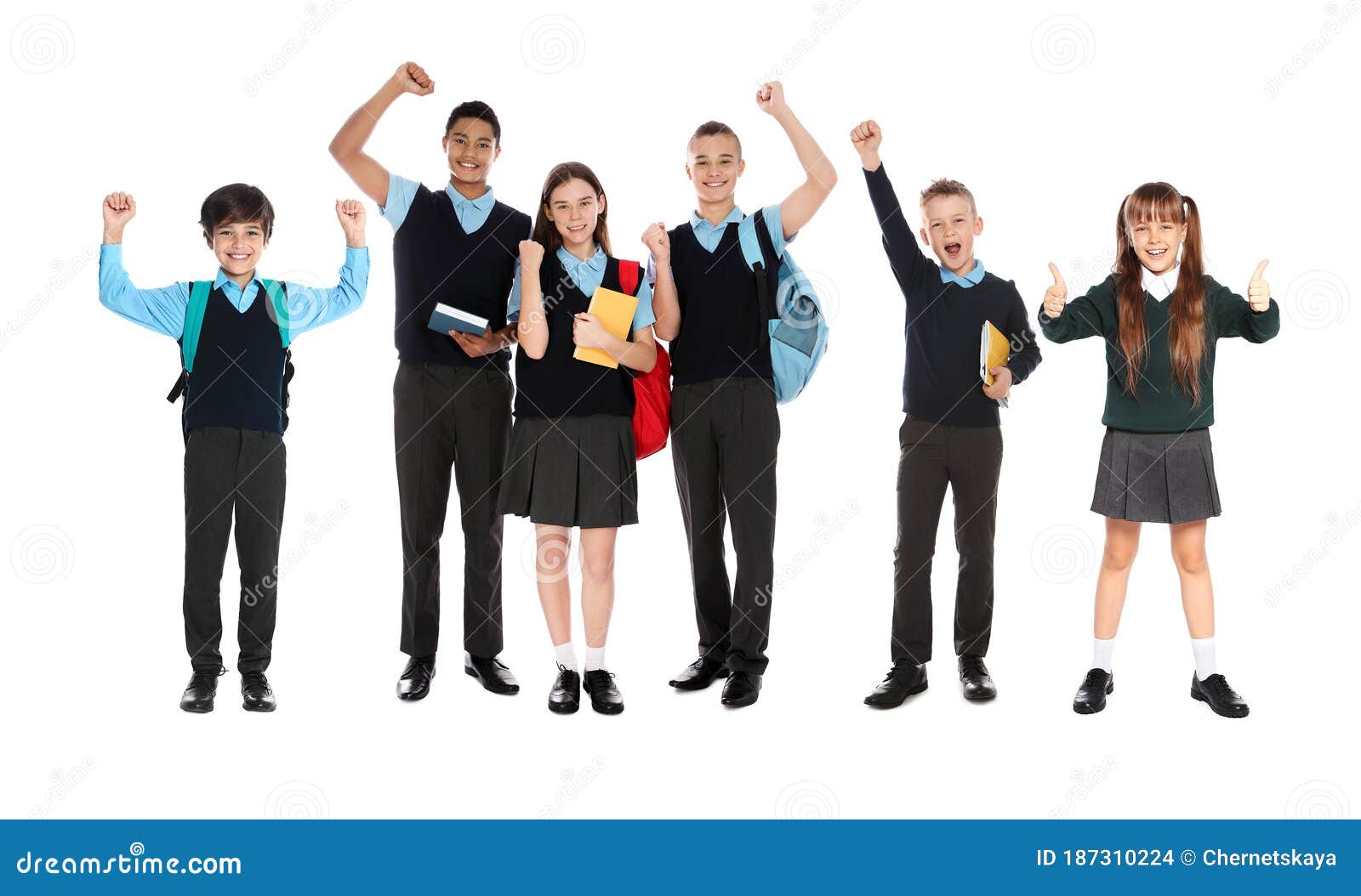 children in school uniforms on background