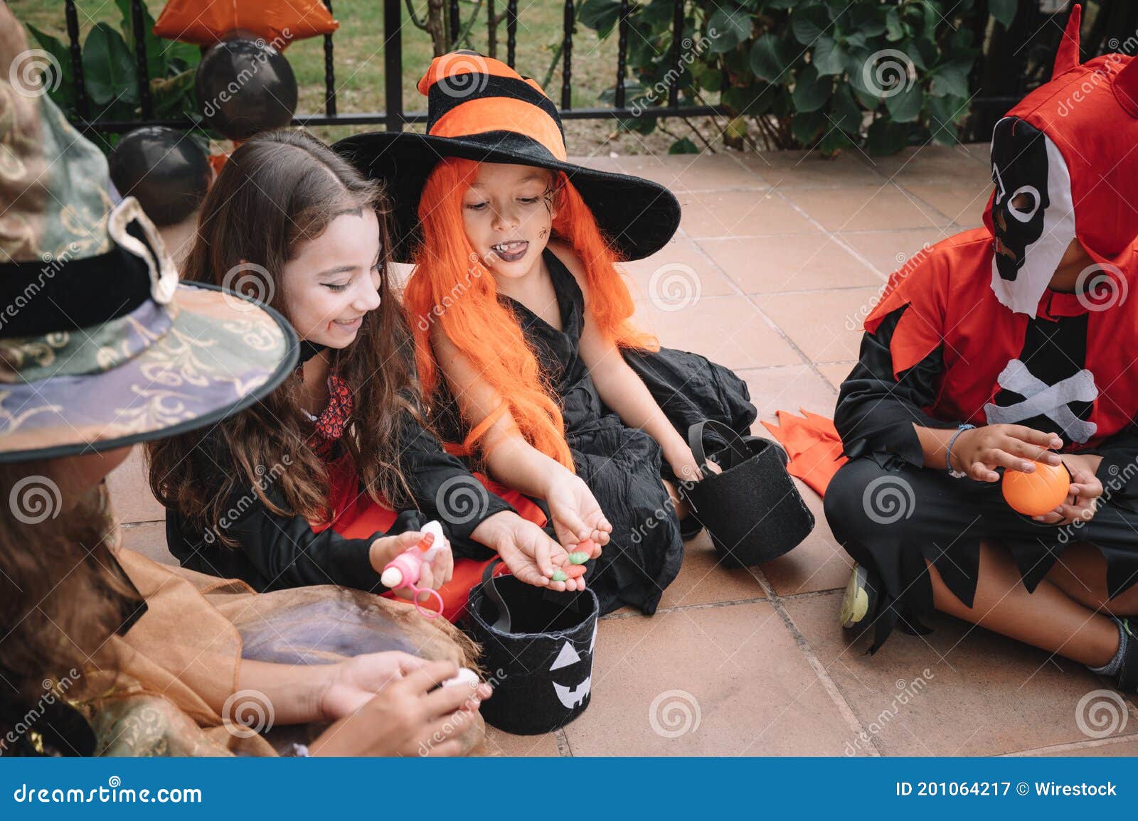 Children Sharing and Comparing Their Candies on Halloween Stock Image ...