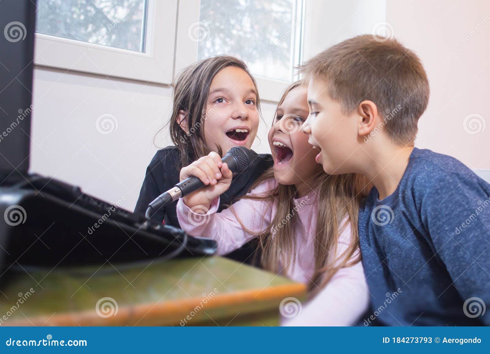 Children Singing Karaoke Together Stock Image Image of happy