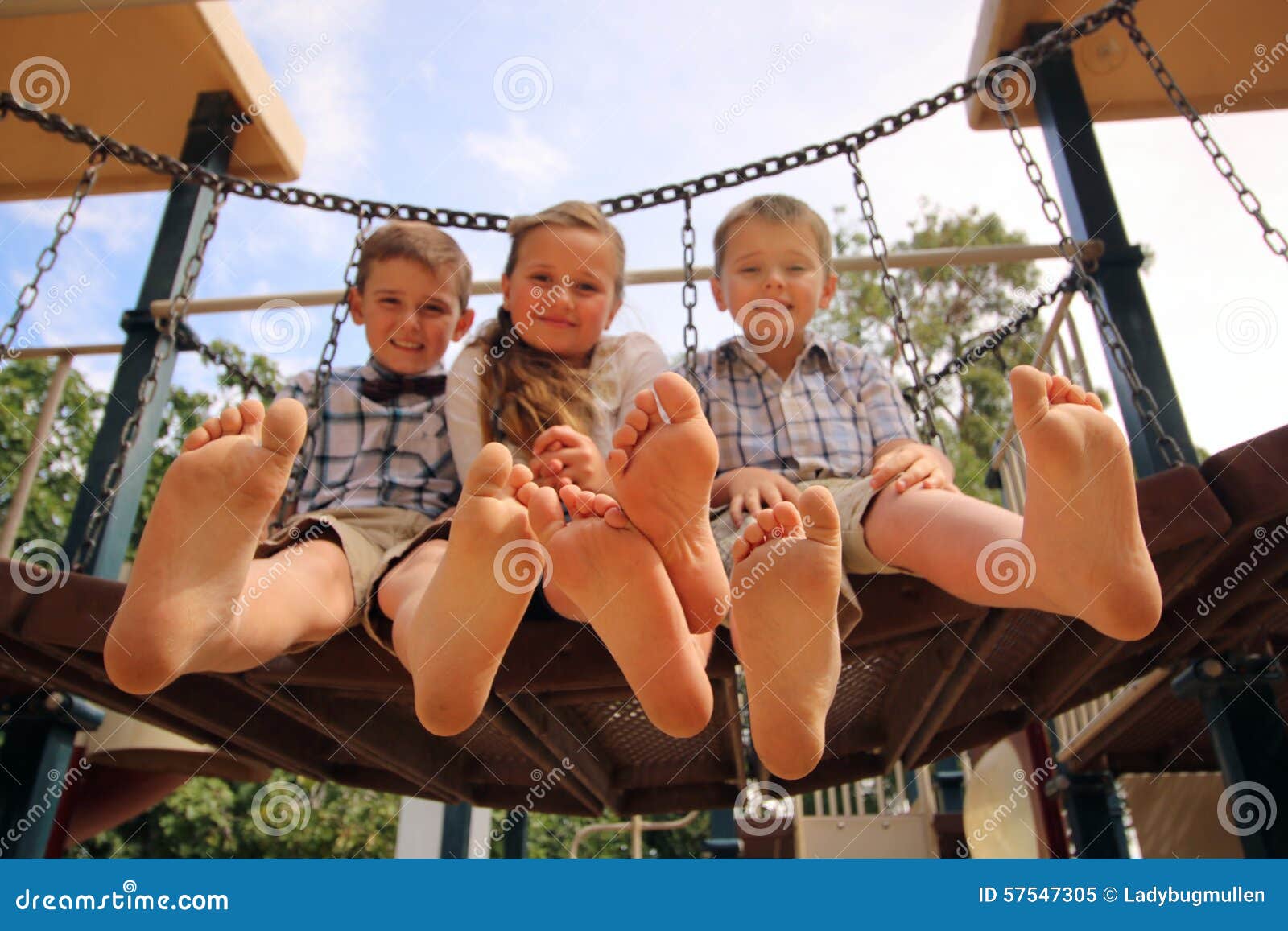 children with their feet in the air