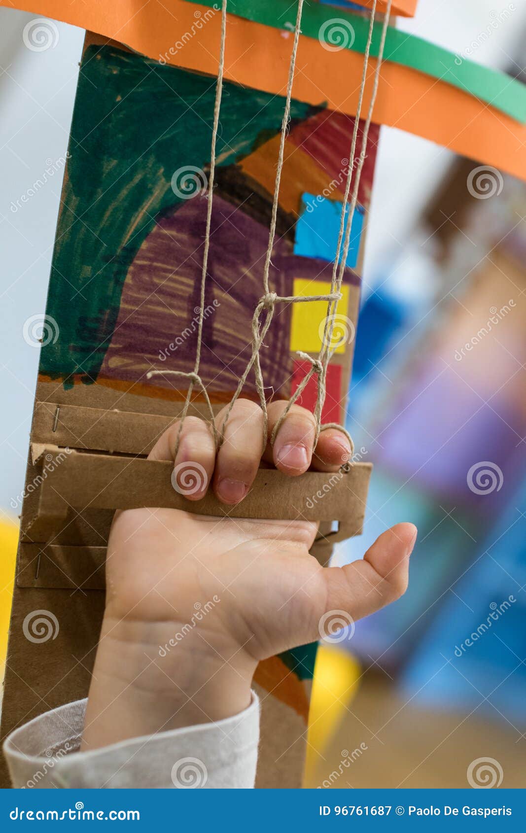 Children Is Wearing A Robotic Arm Made With Cardboard ...