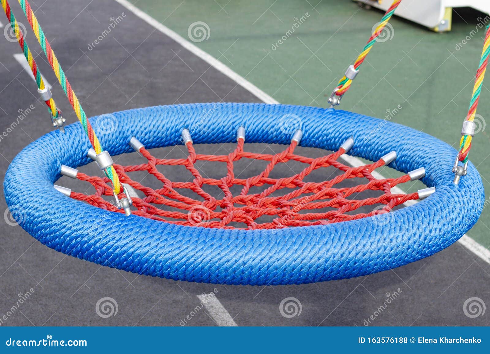 Childrens Playground with Swings. Rope Circle Blue on a Swing