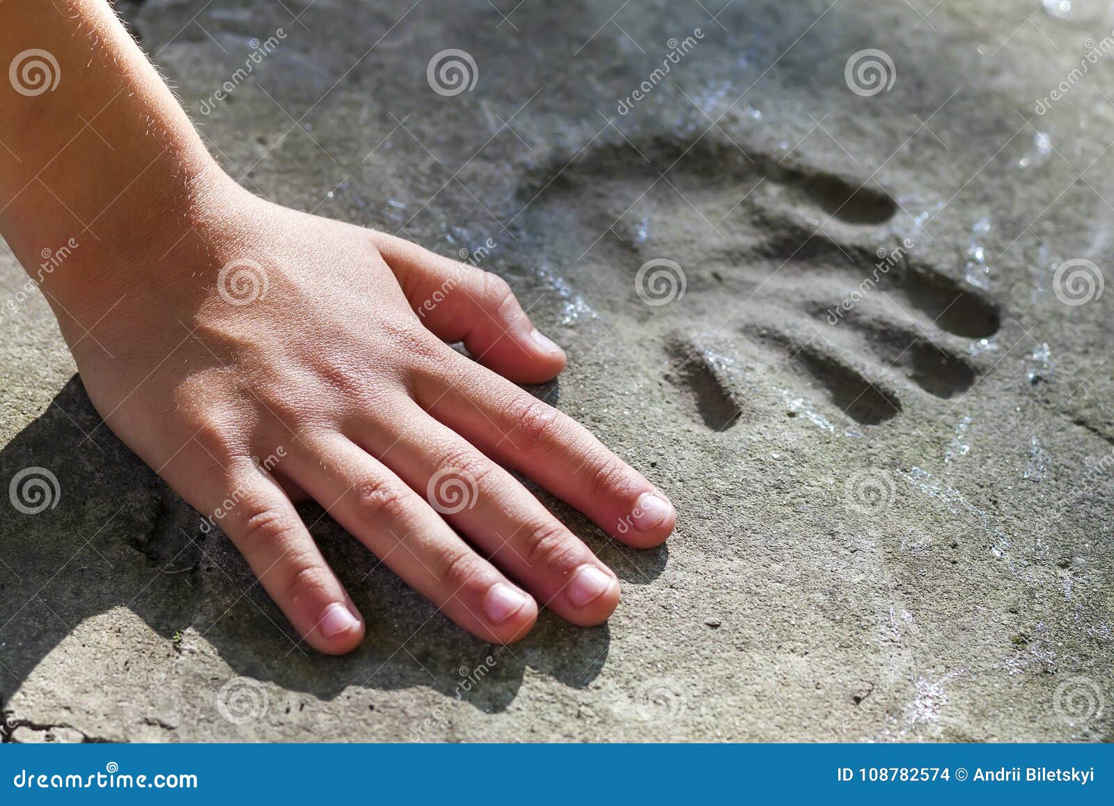 Childs Hand and Memorable Handprint in Concrete Stock Photo - Image of